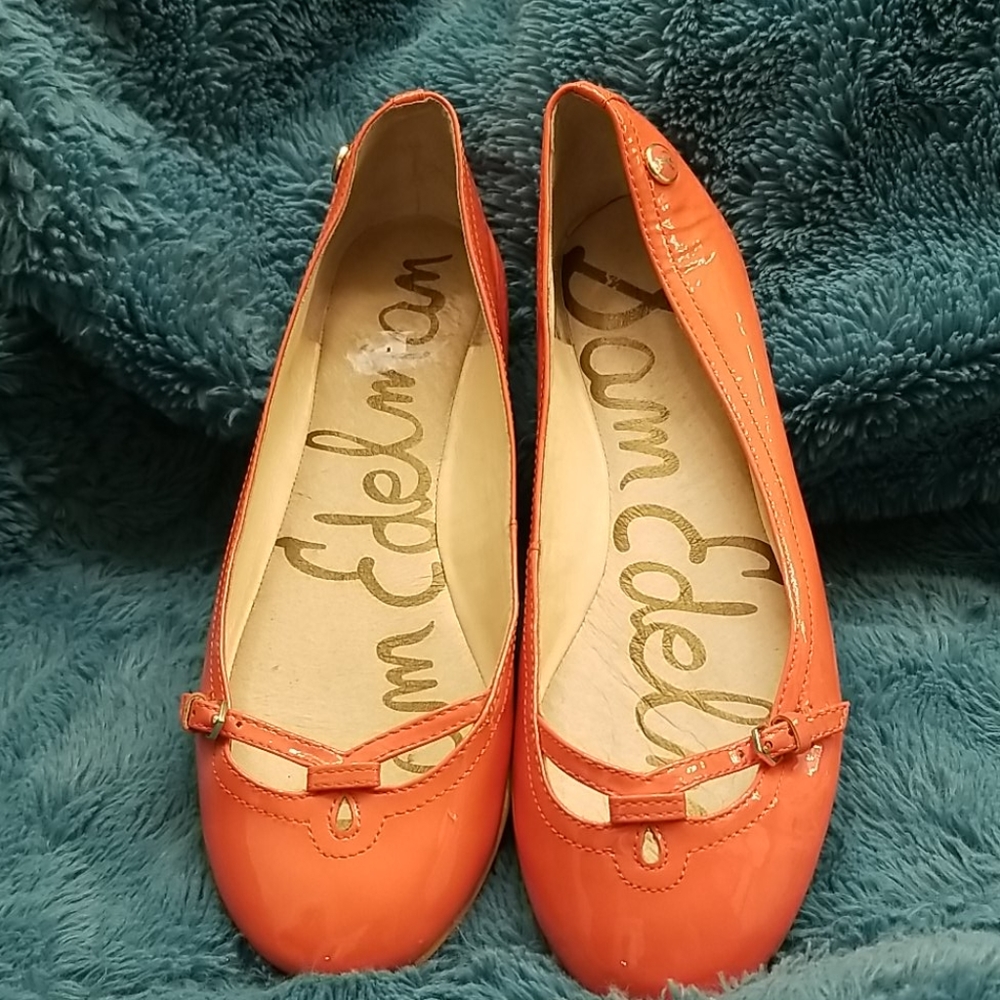 Orange patent leather flats